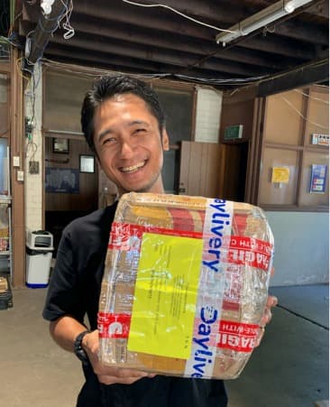 Couple relocating with packed household goods